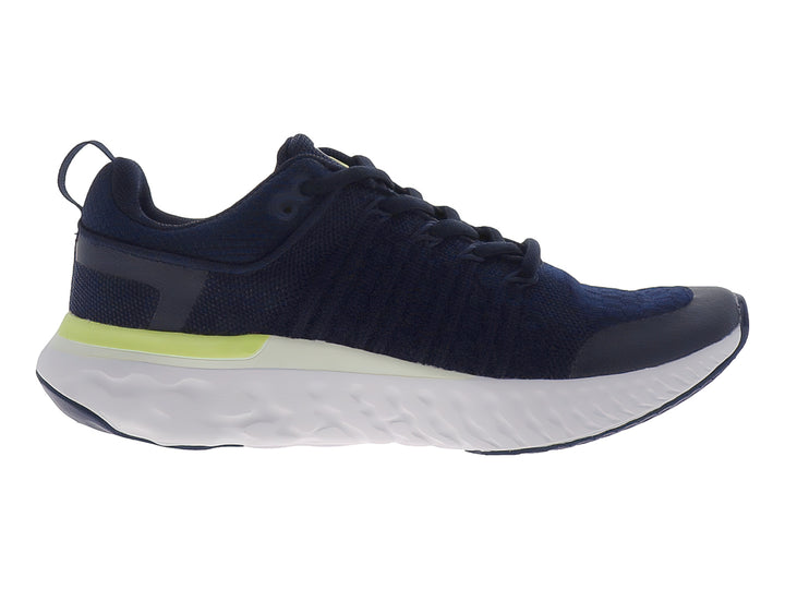 Tenis deportivos Justart en color azul marino con detalles en amarillo limón y suela blanca.