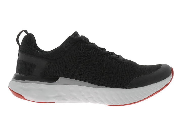 Zapato deportivo JUSTART color negro con suela blanca y base roja.