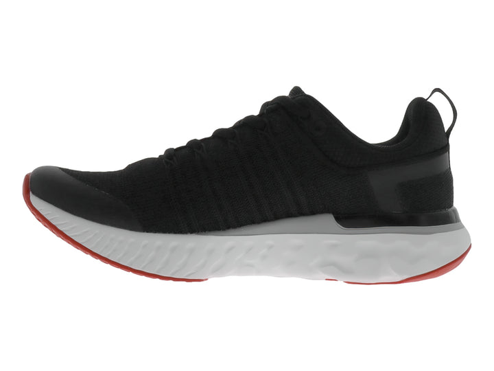 Zapato deportivo JUSTART color negro con suela blanca y base roja.