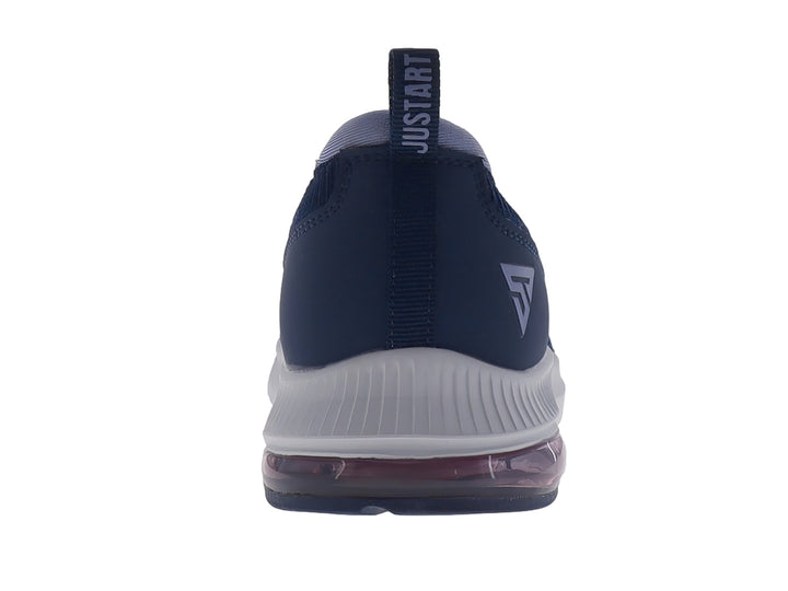 Tenis deportivos Justart color azul marino con suela blanca y cámara de aire en el talón, diseño sin cordones.