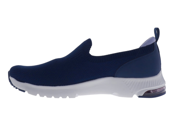 Tenis deportivos Justart color azul marino con suela blanca y cámara de aire en el talón, diseño sin cordones.
