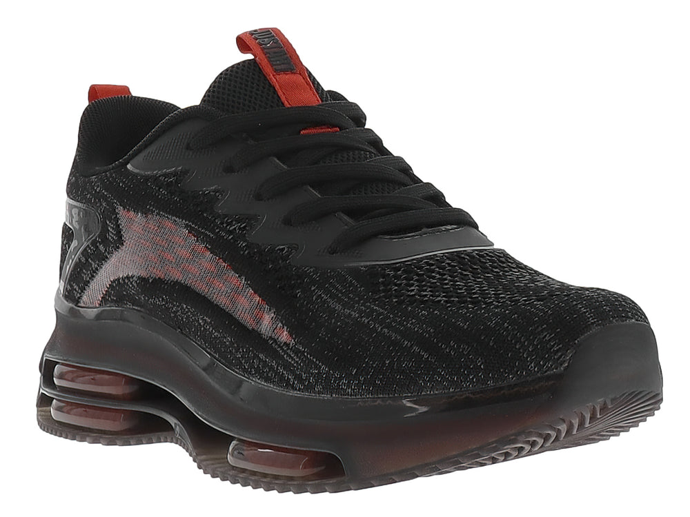 Tenis de baloncesto Justart en color negro con detalles rojos y suela amortiguada transparente.