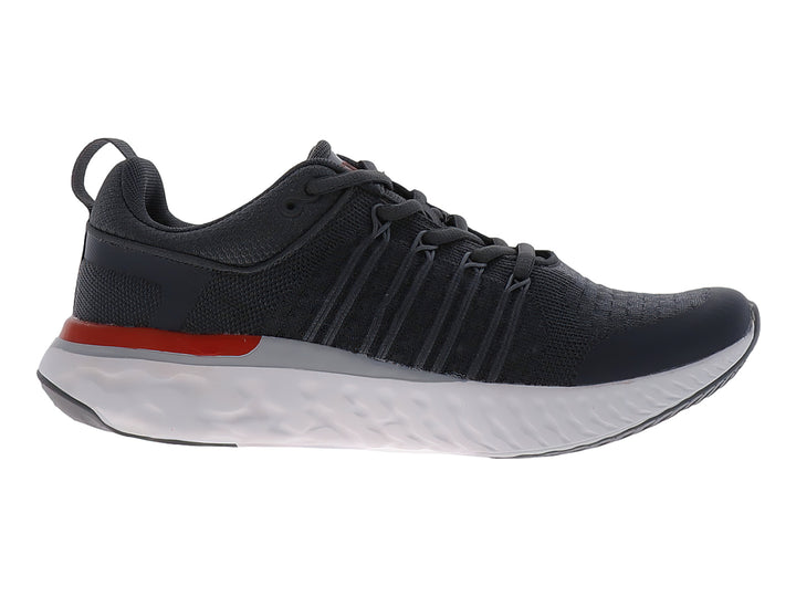 Tenis de baloncesto JUSTART color gris oscuro con suela blanca y un detalle en rojo.
