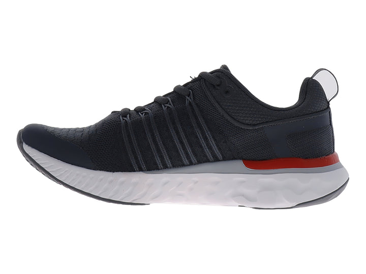 Tenis de baloncesto JUSTART color gris oscuro con suela blanca y un detalle en rojo.