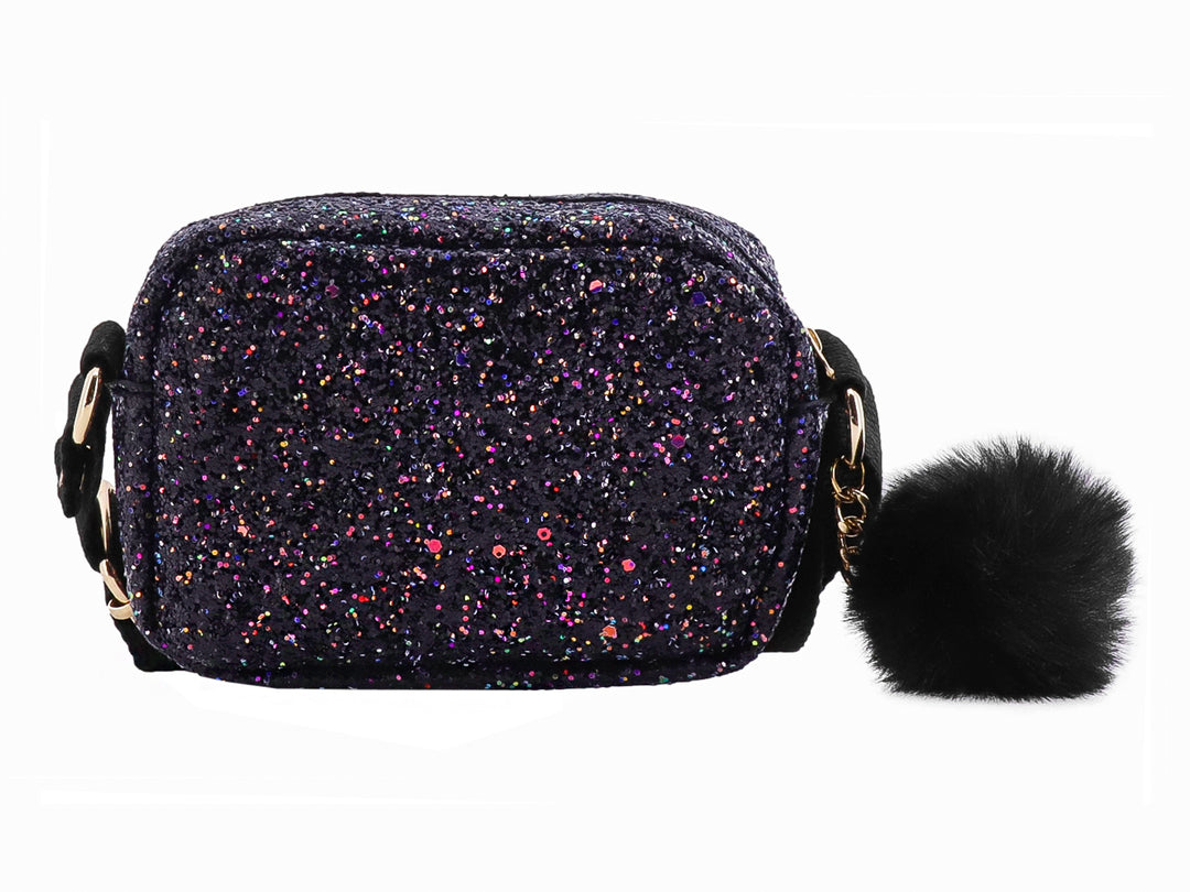 Bolso pequeño color negro con acabado de brillos multicolores y un pompón decorativo lateral.