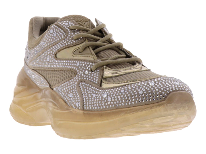 Tenis GUESS color natural con incrustaciones de brillantes y suela gruesa translúcida.