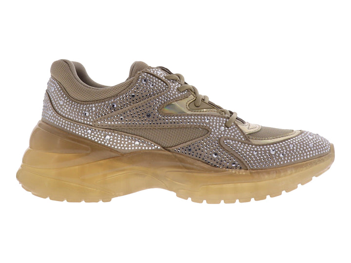Tenis GUESS color natural con incrustaciones de brillantes y suela gruesa translúcida.