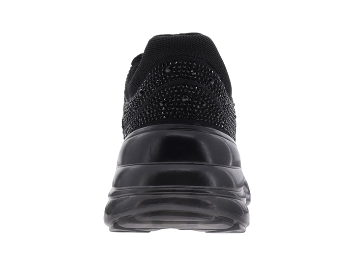 Tenis deportivos Guess color negro con detalles de brillantes y suela gruesa.