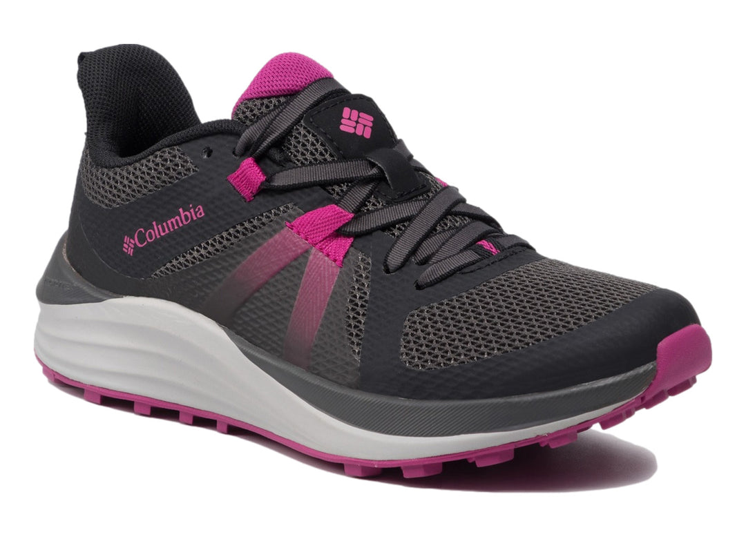 Tenis deportivos Columbia color negro y rosa fucsia con suela blanca y detalles en malla.