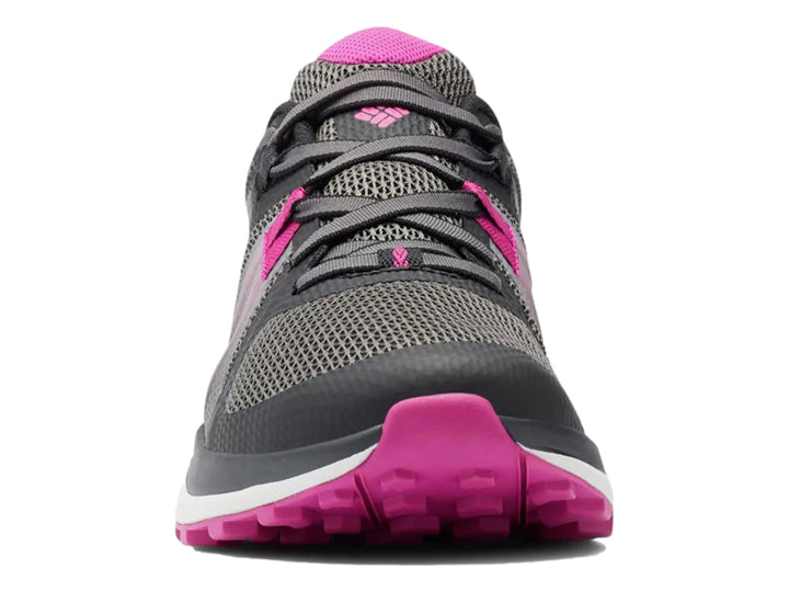 Tenis deportivos Columbia color negro y rosa fucsia con suela blanca y detalles en malla.