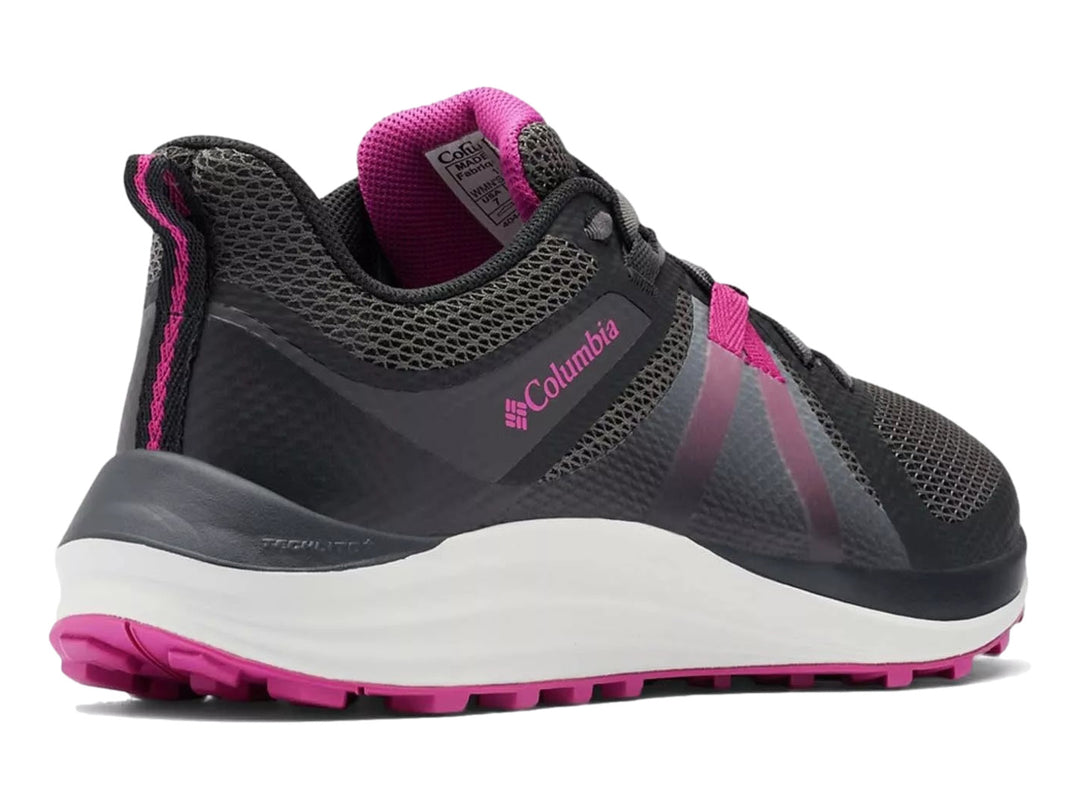 Tenis deportivos Columbia color negro y rosa fucsia con suela blanca y detalles en malla.