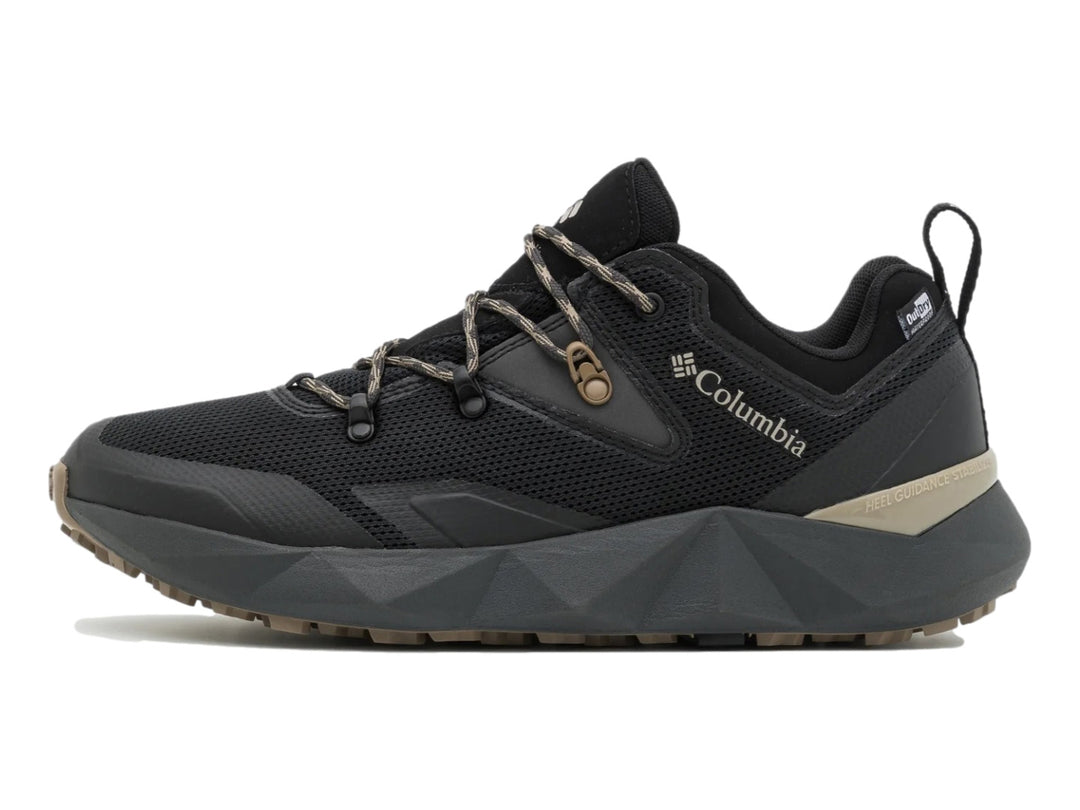 Zapato deportivo Columbia Facet 60 Low OutDry en color negro y gris oscuro para actividades al aire libre.