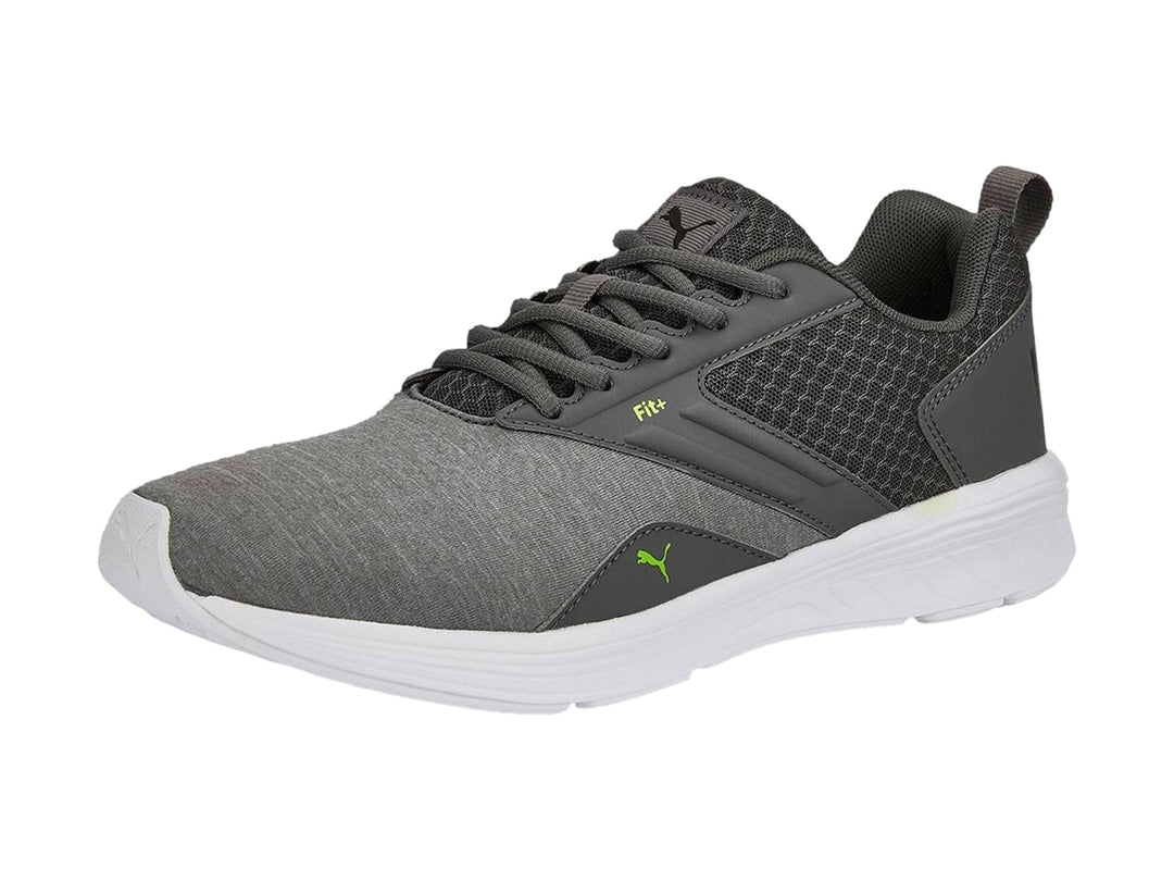 Tenis deportivos PUMA color gris con suela blanca, vista lateral.