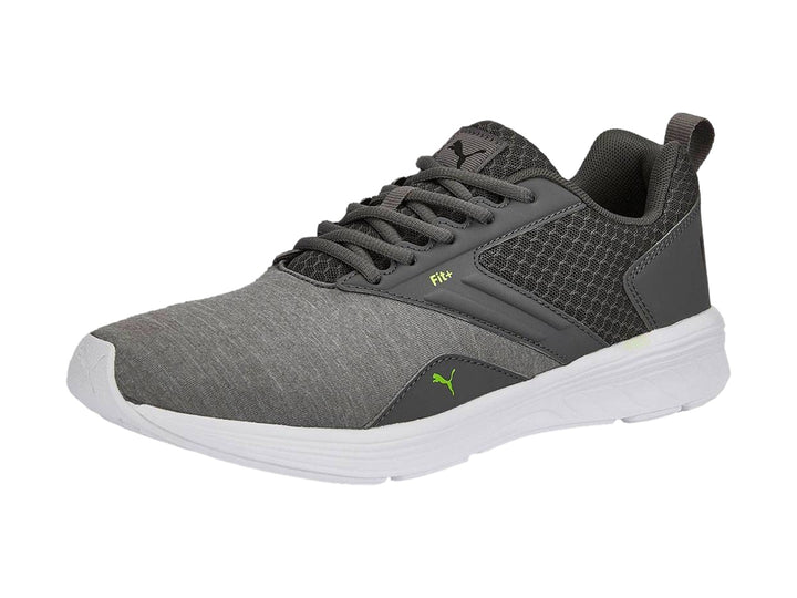 Tenis deportivos PUMA color gris con suela blanca, vista lateral.