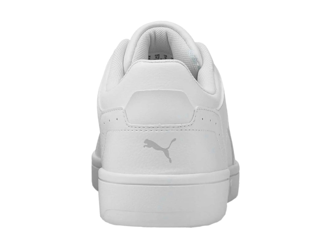 Tenis PUMA Rebound Joy Low en color blanco, vista lateral sobre fondo blanco.