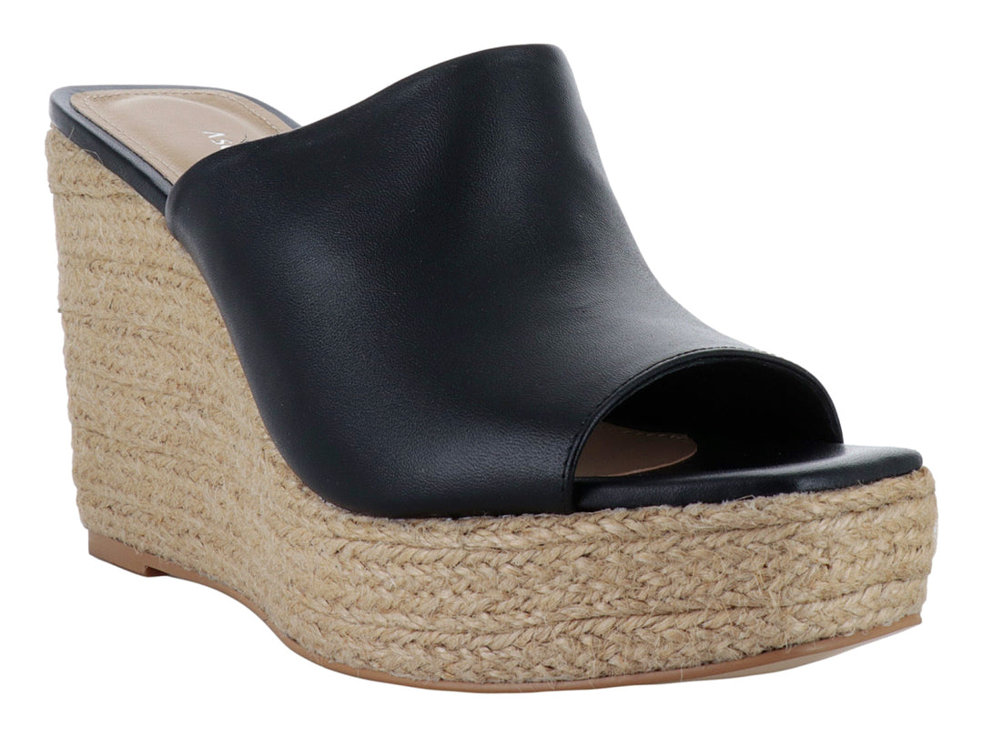 Sandalia de plataforma color negro con base de yute beige para mujer.