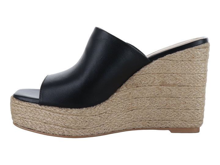 Sandalia de plataforma color negro con base de yute beige para mujer.
