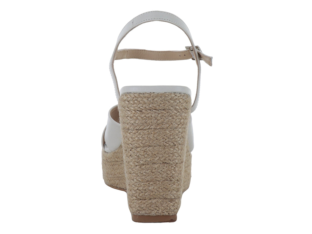 Sandalias de plataforma color yogurt con tacón cuña de yute y correa ajustable al tobillo.