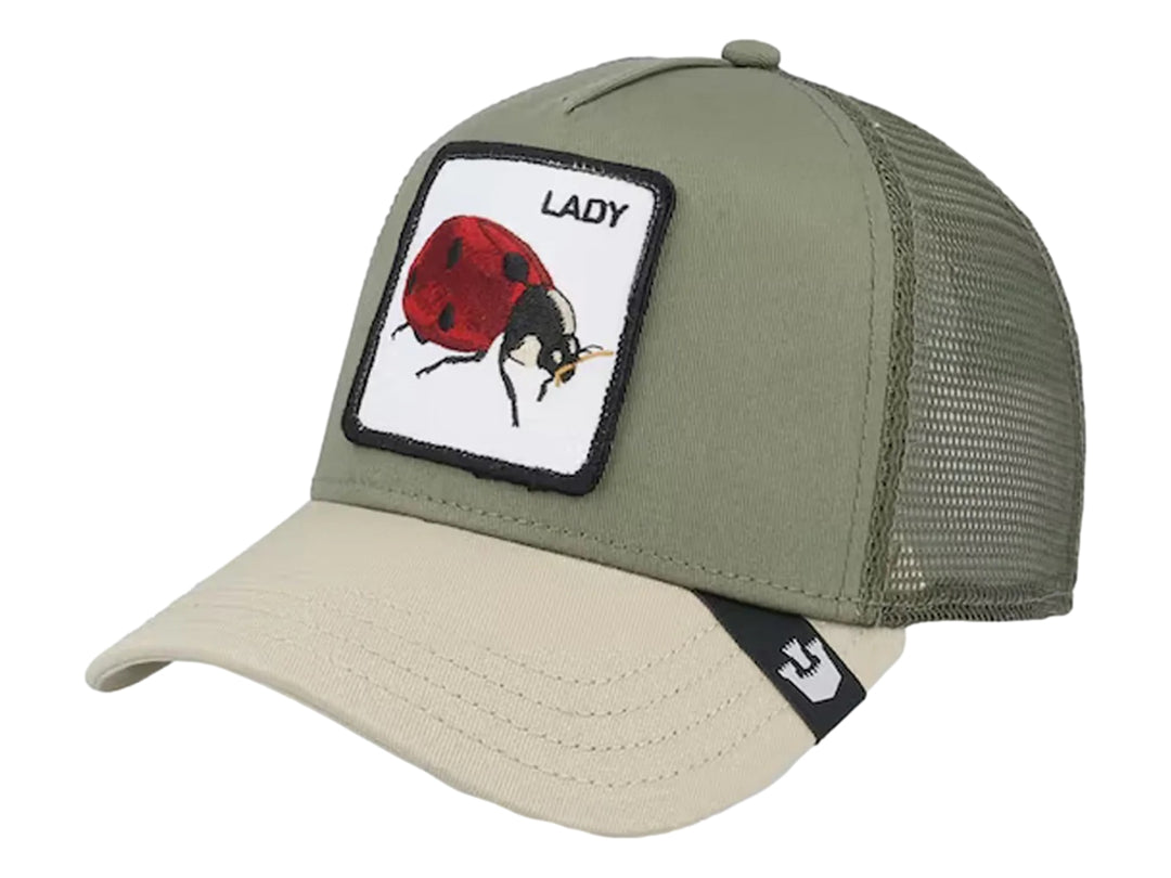 Gorra Goorin Bros color olive con visera beige y parche frontal de una mariquita con la palabra LADY.
