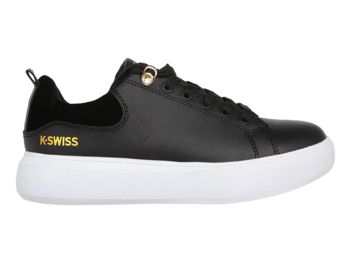 Tenis K-Swiss color negro con suela blanca y detalles en dorado, estilo casual.