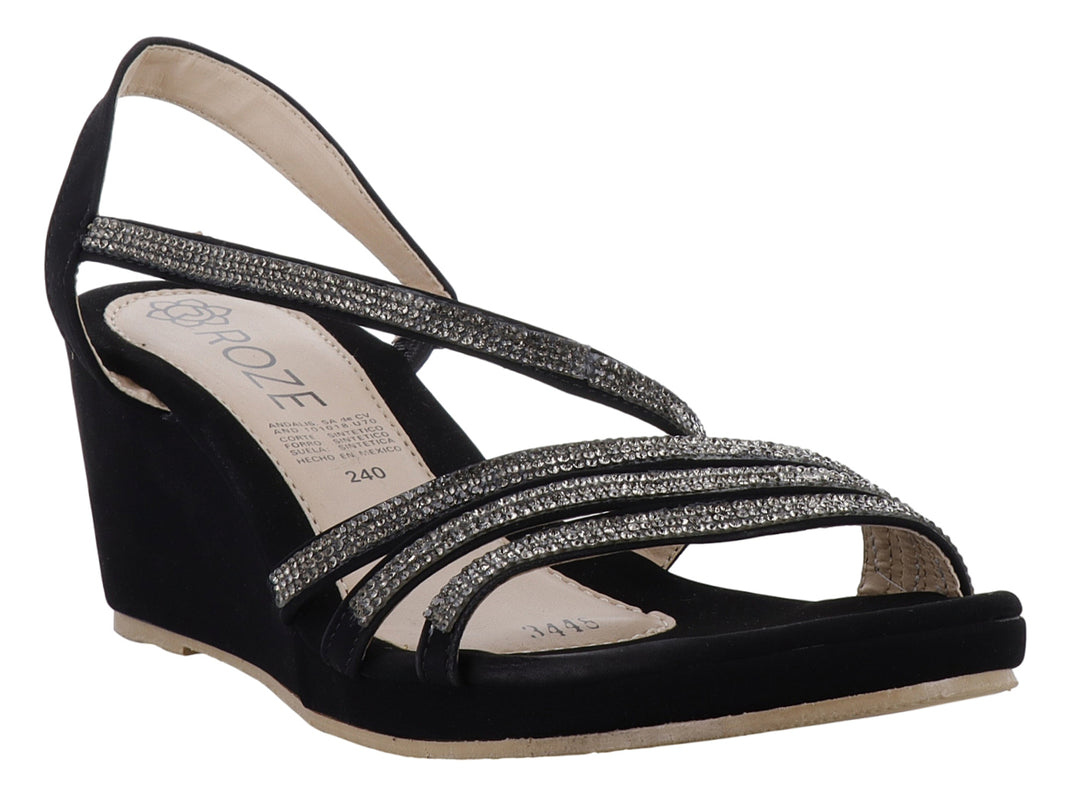 Sandalia negra de plataforma con tiras brillantes plateadas y tacón cuña para mujer.