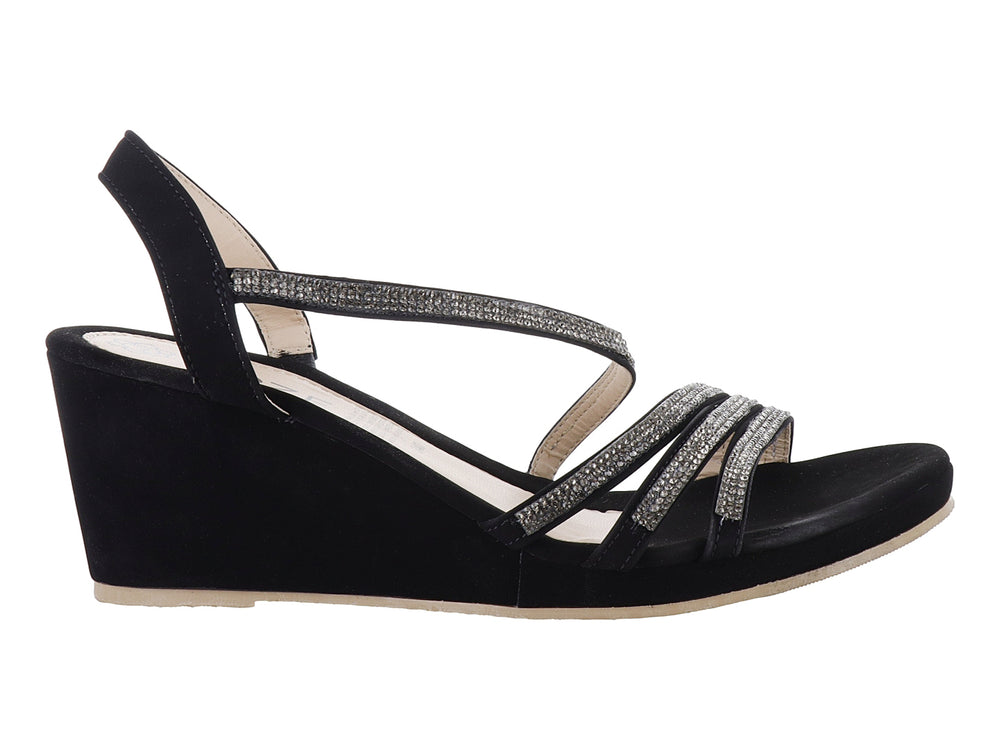 Sandalia negra de plataforma con tiras brillantes plateadas y tacón cuña para mujer.