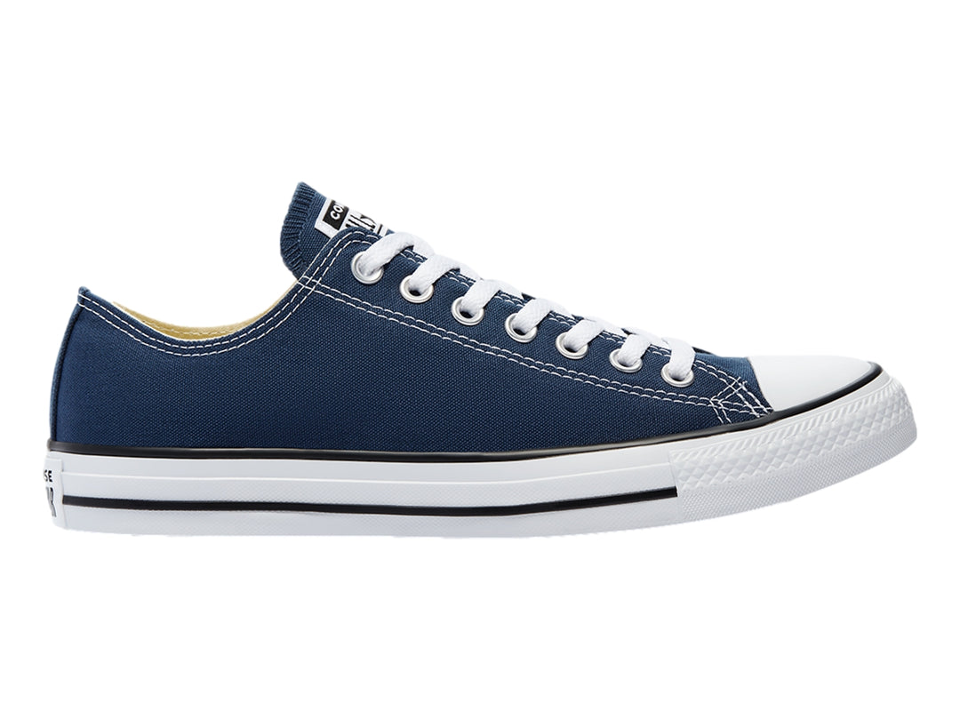 Tenis Converse modelo M9697 en color navy con suela y cordones blancos, vista lateral.