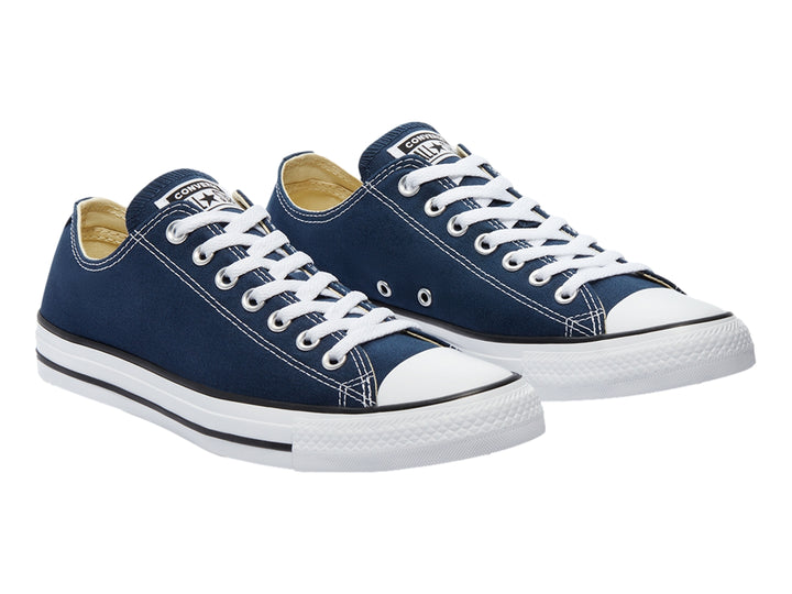 Tenis Converse modelo M9697 en color navy con suela y cordones blancos, vista lateral.