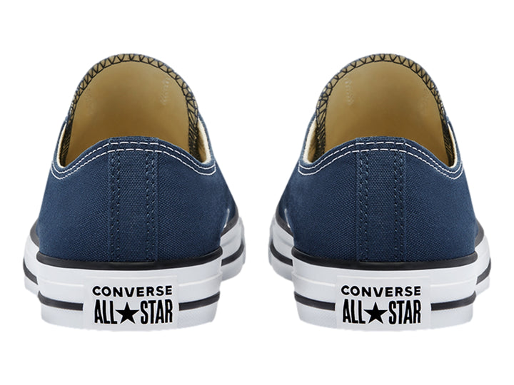 Tenis Converse modelo M9697 en color navy con suela y cordones blancos, vista lateral.