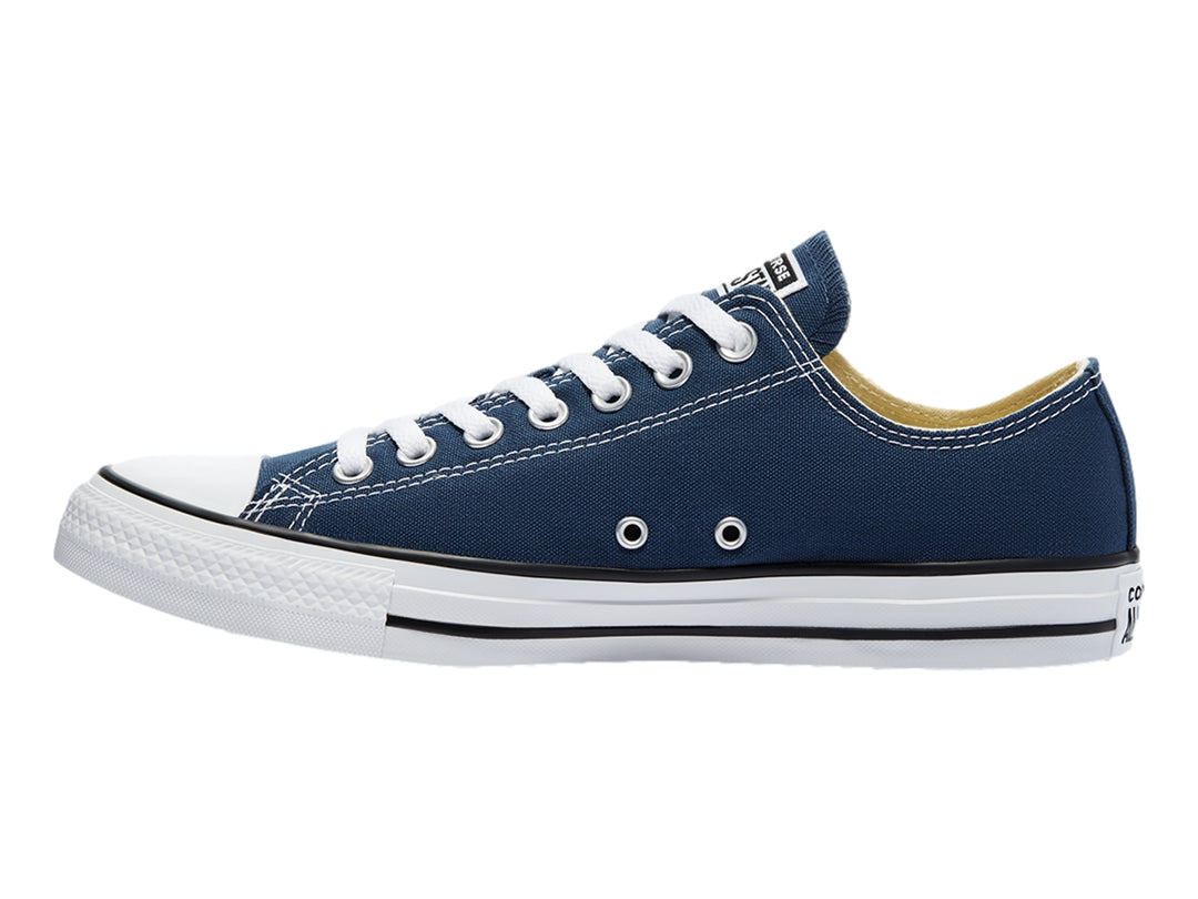 Tenis Converse modelo M9697 en color navy con suela y cordones blancos, vista lateral.