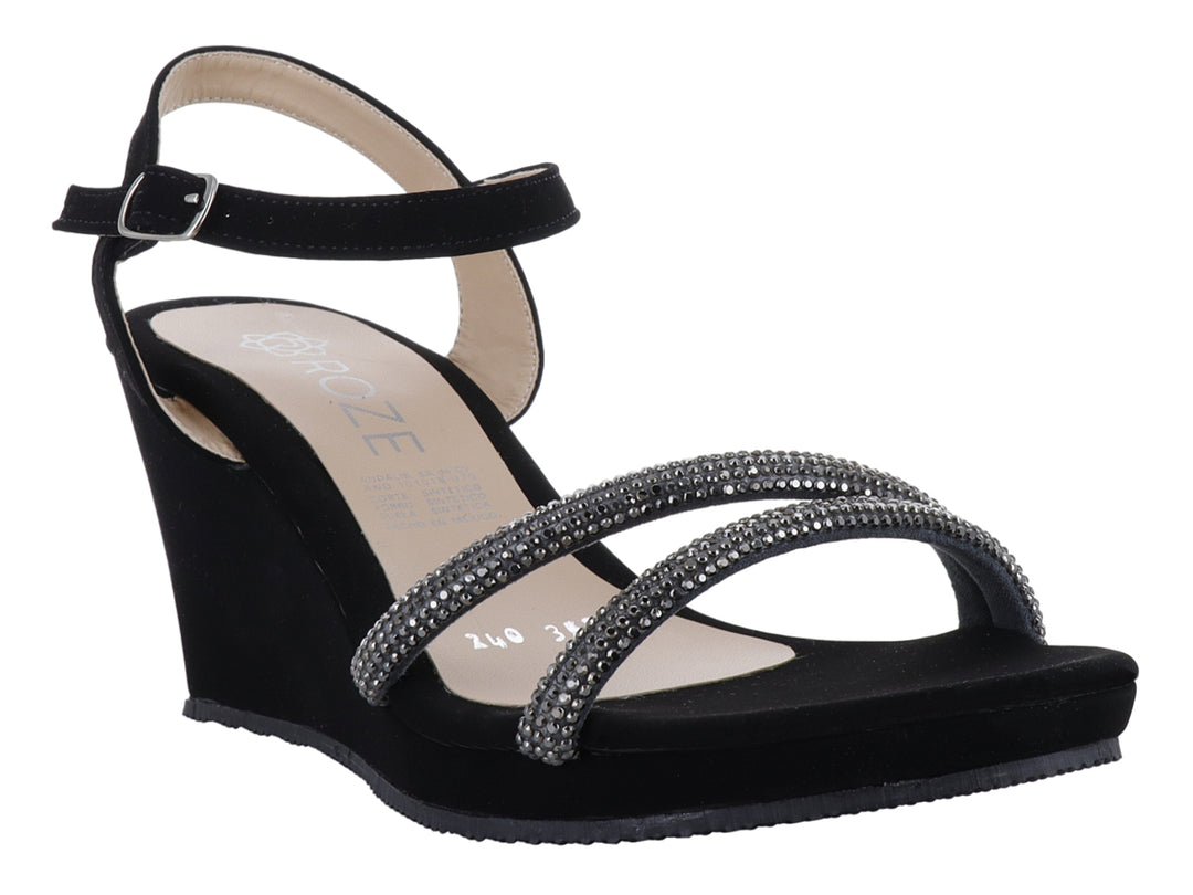 Sandalia negra de plataforma con tiras decoradas con brillantes y correa ajustable al tobillo.
