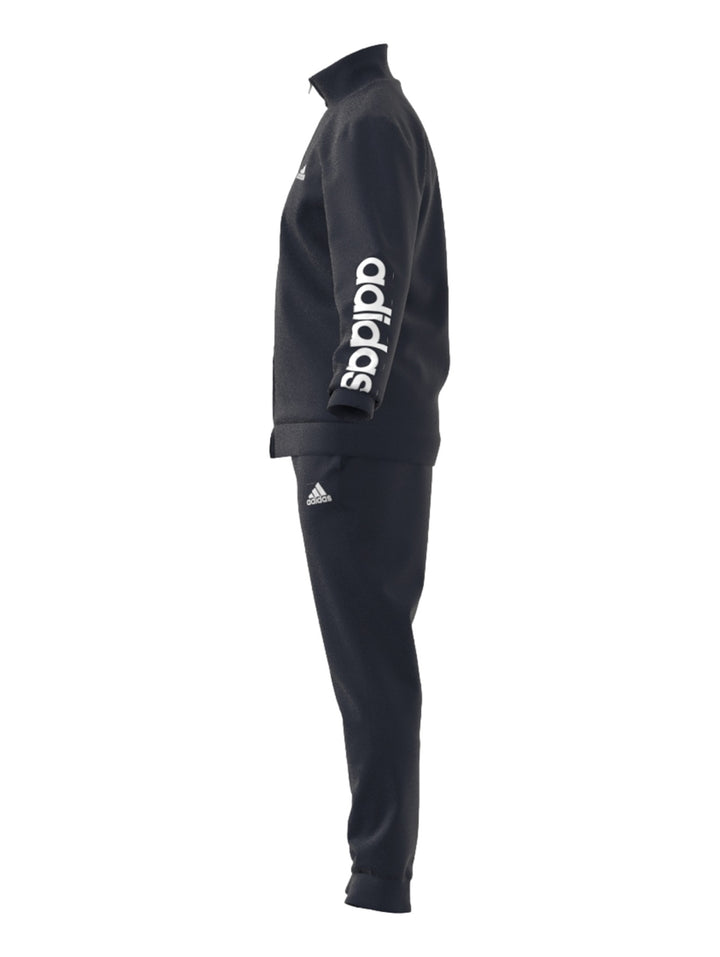 Conjunto deportivo Adidas color azul marino oscuro compuesto por chaqueta y pantalón.