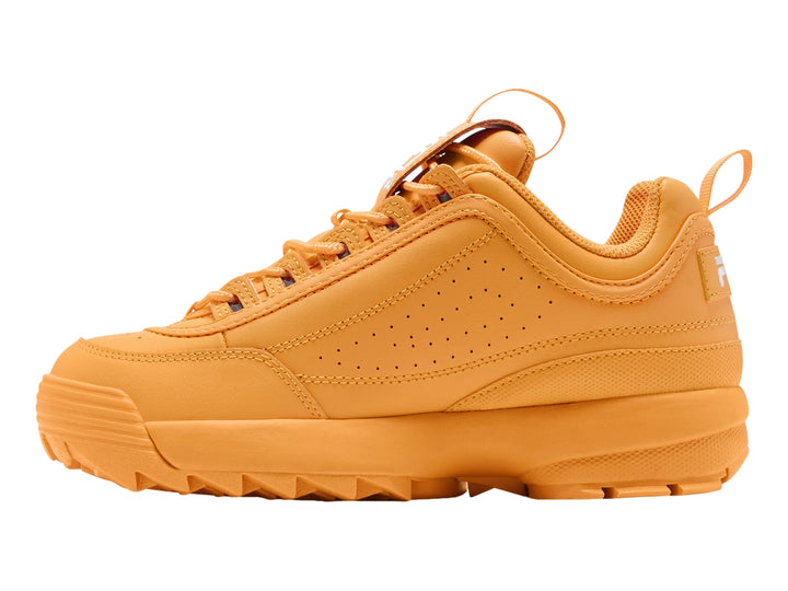 Tenis FILA Disruptor II Premium color amarillo marigold con suela gruesa y dentada.