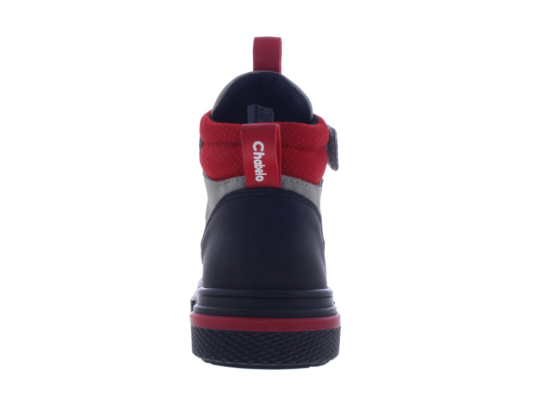 Botín infantil marca Chabelo en color negro con detalles en rojo y gris, cierre de cordones y cinta de velcro.