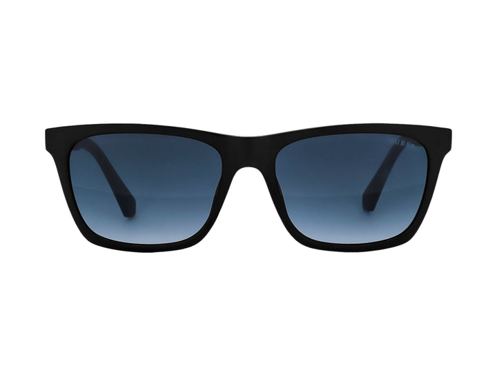 Lentes de sol GUESS con montura cuadrada color negro mate y cristales en tono azul degradado.