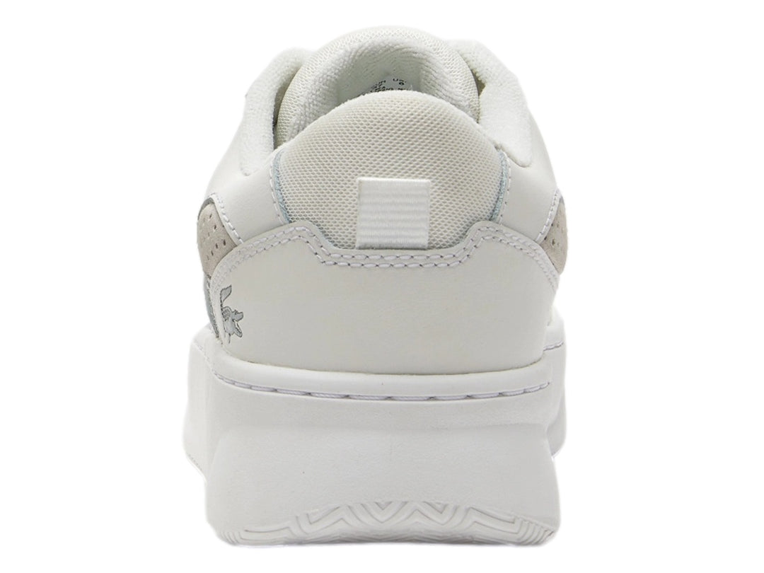 Tenis blancos Lacoste L005 de plataforma con agujetas y suela gruesa.
