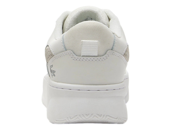 Tenis blancos Lacoste L005 de plataforma con agujetas y suela gruesa.