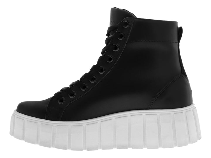 Tenis botín negro con suela de plataforma blanca y cordones negros.