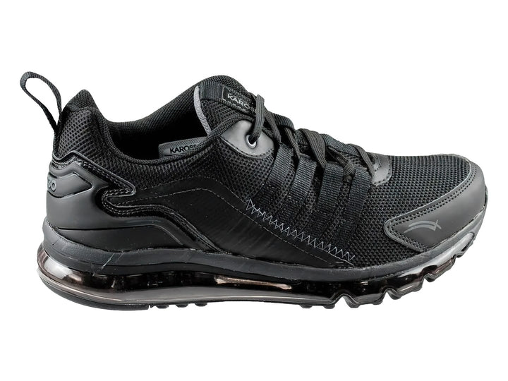 Tenis deportivos de baloncesto color negro con suela de aire y tejido de malla.