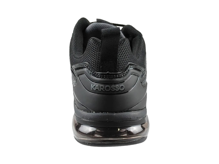 Tenis deportivos de baloncesto color negro con suela de aire y tejido de malla.