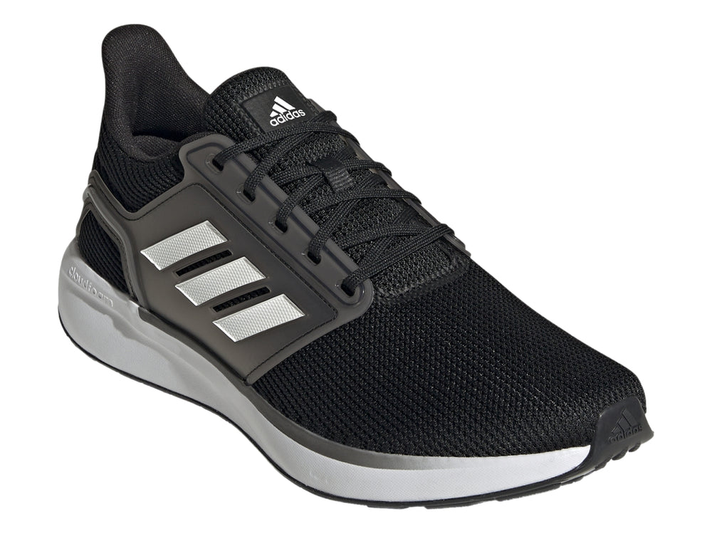 Tenis deportivos Adidas en color negro con detalles en blanco y gris, diseño ligero para correr.