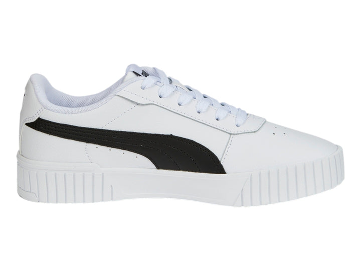 Tenis PUMA Carina 2.0 blancos con franja negra lateral y suela de plataforma blanca.