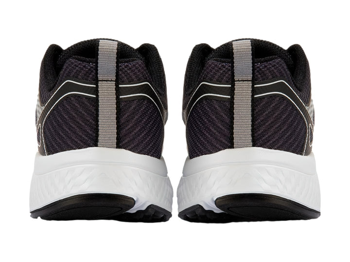 Tenis deportivos Skechers Go Run Consistent en color negro con suela blanca y detalles lineales.