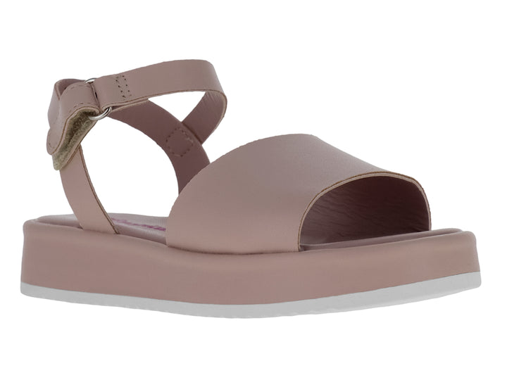 Sandalia de plataforma color nude con correa ajustable al tobillo y suela blanca.
