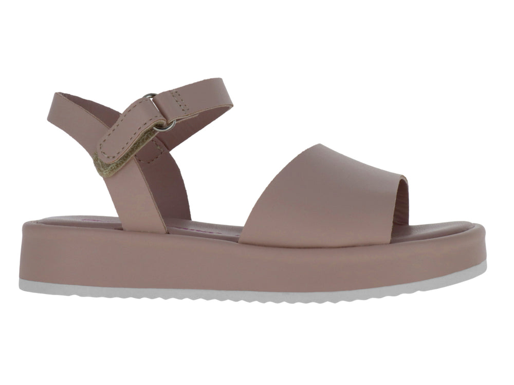 Sandalia de plataforma color nude con correa ajustable al tobillo y suela blanca.