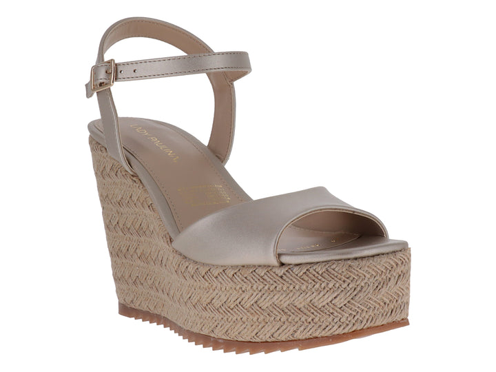 Sandalia Lady Paulina color platina con plataforma de yute trenzado y correa ajustable al tobillo.