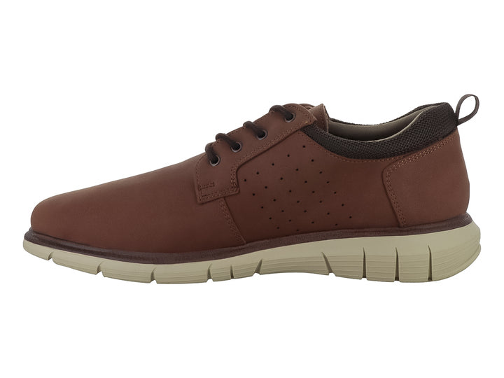 Zapato casual Dockers color tan con suela beige y detalles perforados en el costado.