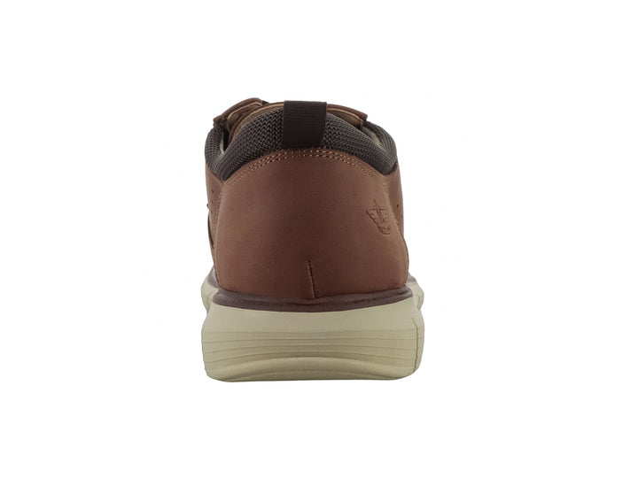 Zapato casual Dockers color tan con suela beige y detalles perforados en el costado.