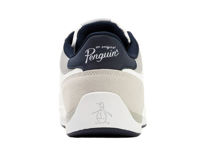 Tenis Penguin color blanco con detalles en gris y azul marino, diseño casual con agujetas blancas.