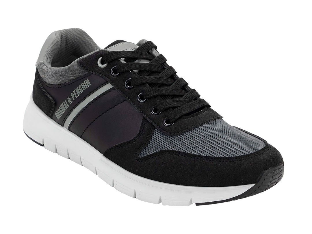 Tenis deportivos Penguin en color negro y gris con suela blanca y cordones negros.